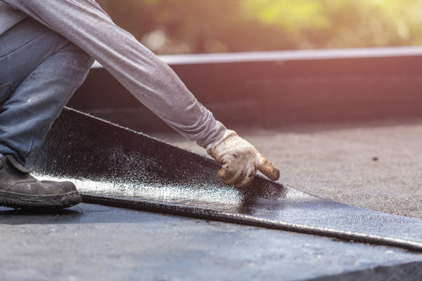 Professional Waterproofing technician working in Springville, VA